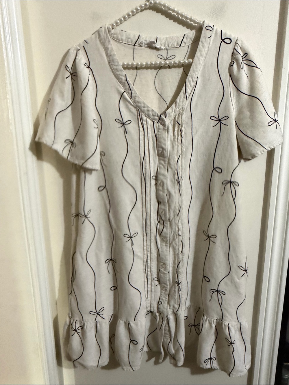 Jane and Delancey Cream Mini Dress with Black Bow Line Print